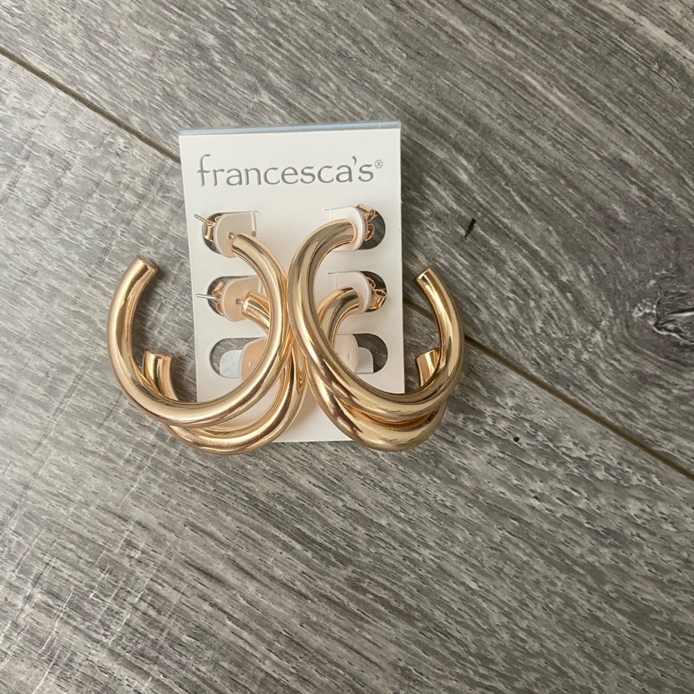 Francesca’s hoop earring (one pair is missing)